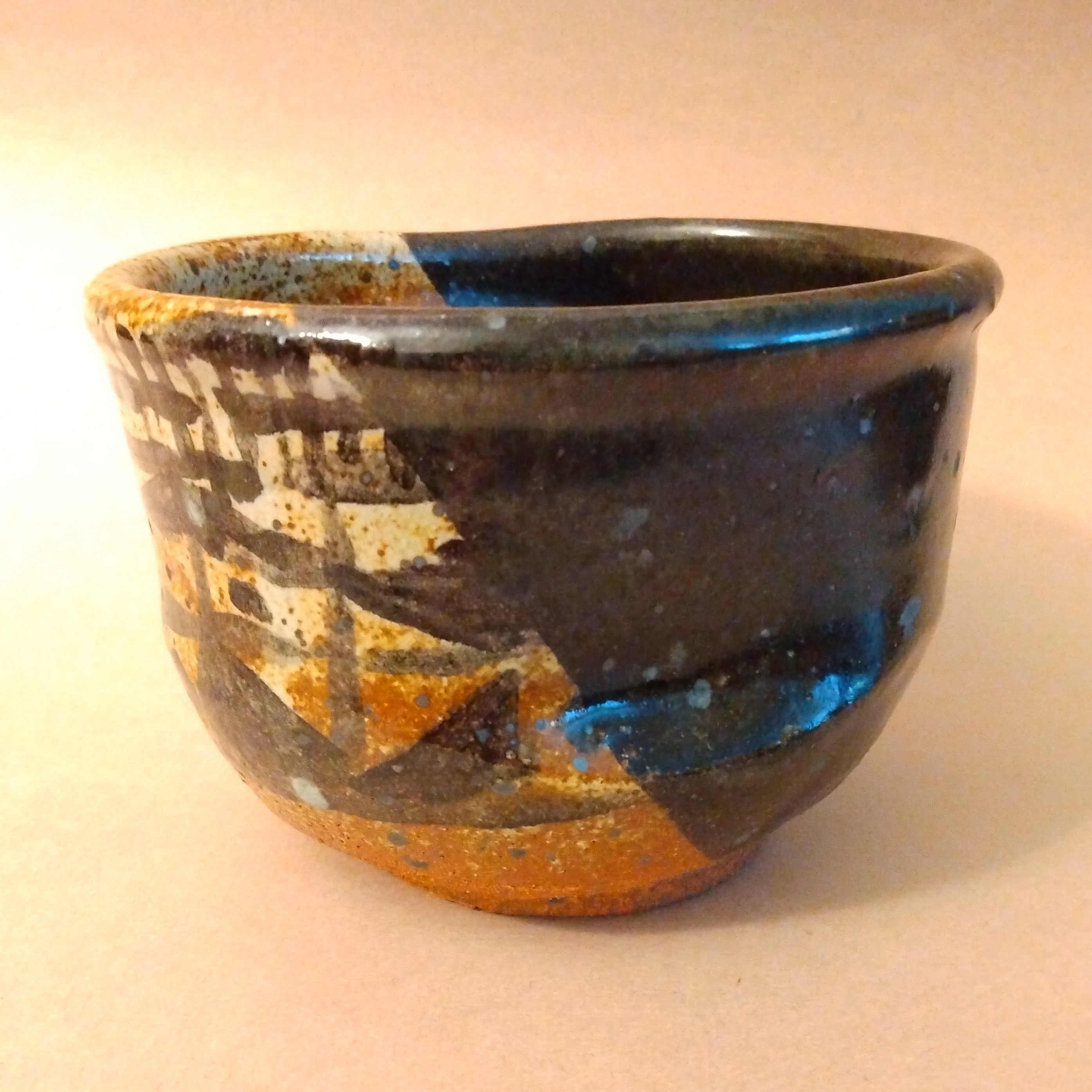 Oribe Matcha Chawan, Tea Bowl, Kutsu-gata (shoe-shaped), Kake-wake (split glaze) design, by Sachiko Furya