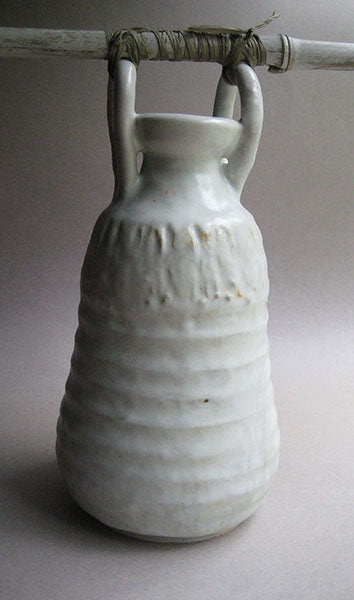 Vase with lug handles and hanging stick, white Shino glaze, by Sachiko Furuya