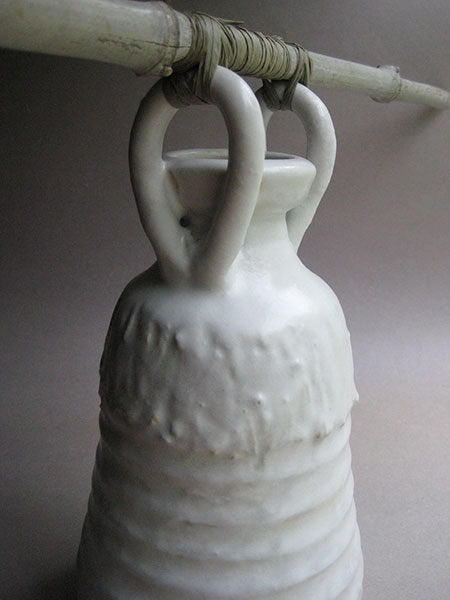 Vase with lug handles and hanging stick, white Shino glaze, by Sachiko Furuya