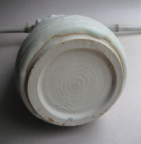 Vase with lug handles and hanging stick, white Shino glaze, by Sachiko Furuya