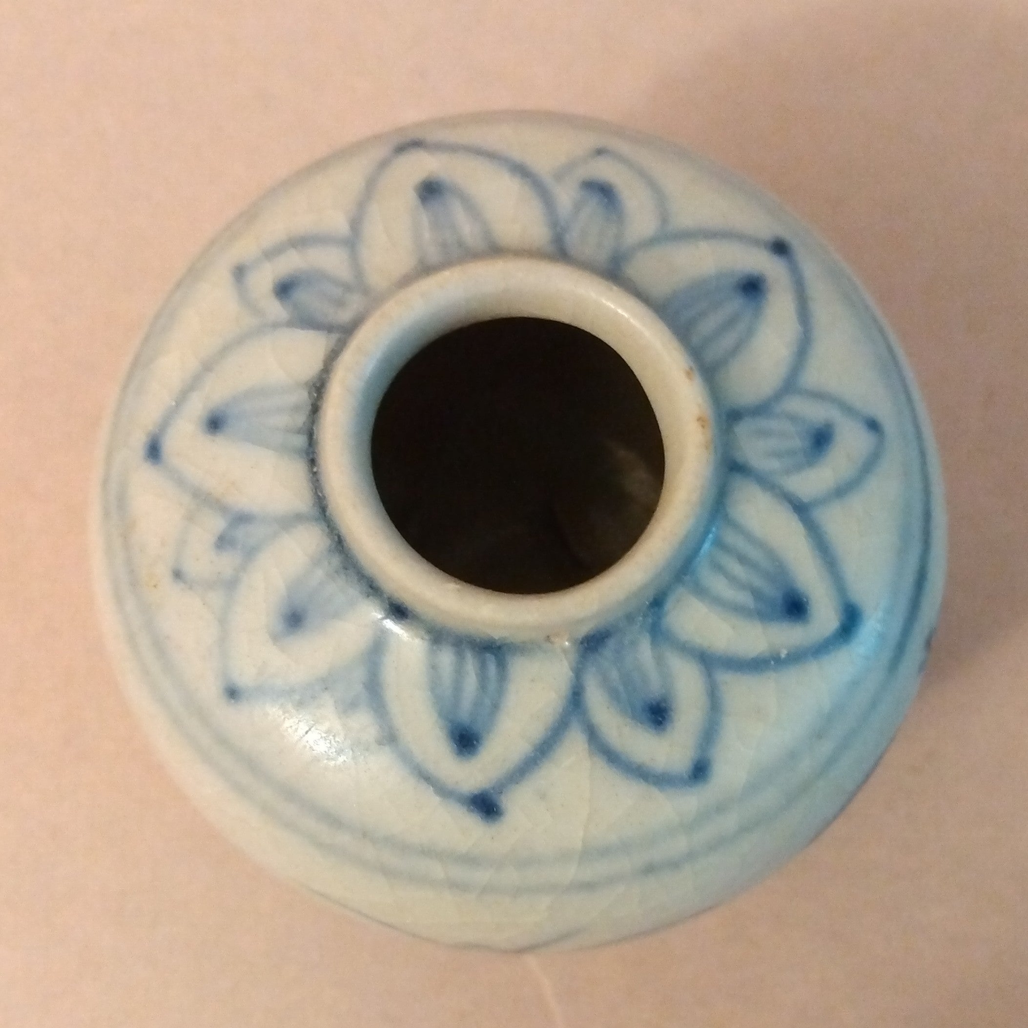 Ceramic Jarlet with underglaze cobalt blue decoration of birds and grasses on the body and lotus petals around the shoulders. Vietnam, ca. 15-17th C