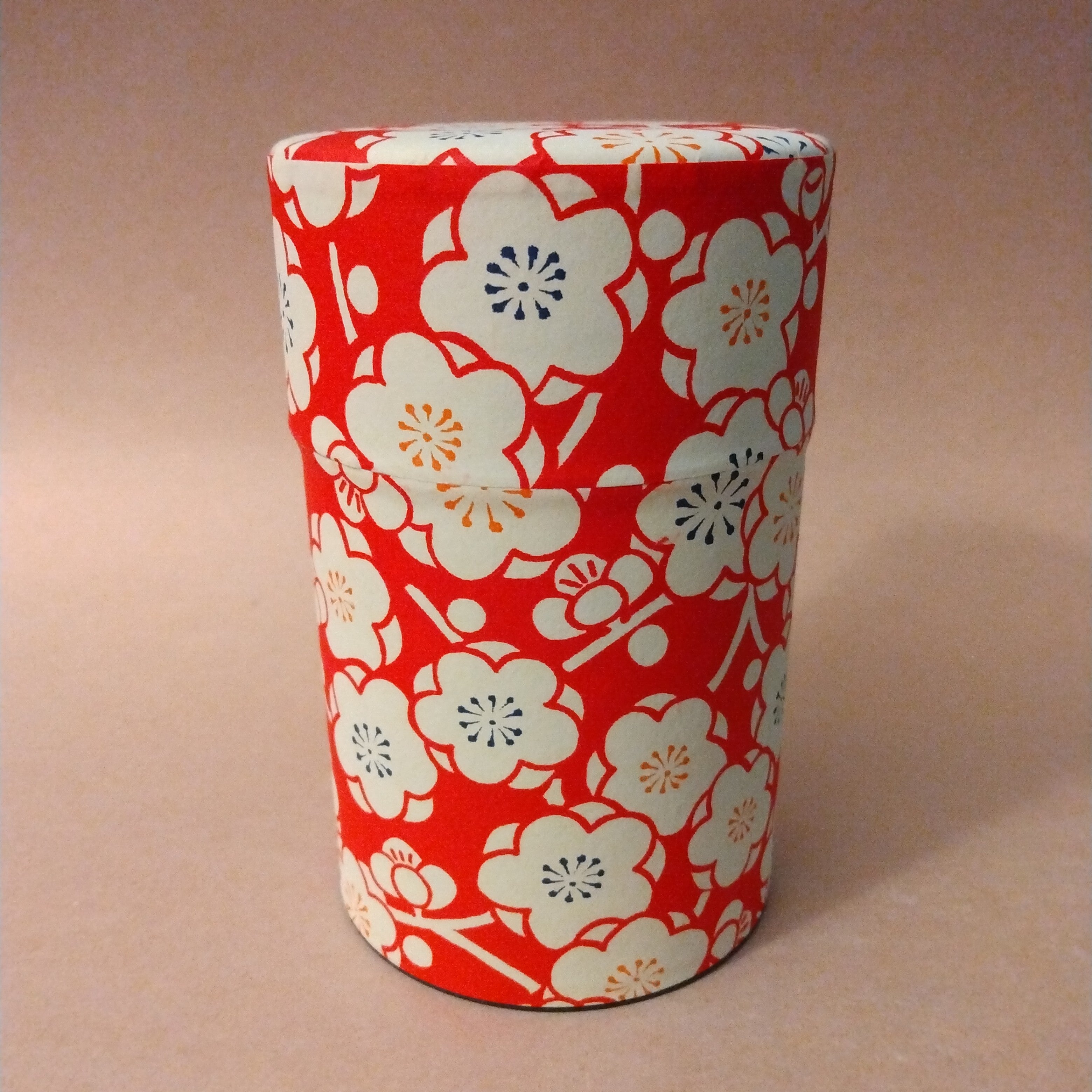 Chazutsu, Tea Canister, holds 150 grams, Stainless Steel covered in Red Washi Paper with Plum Blossom Motif